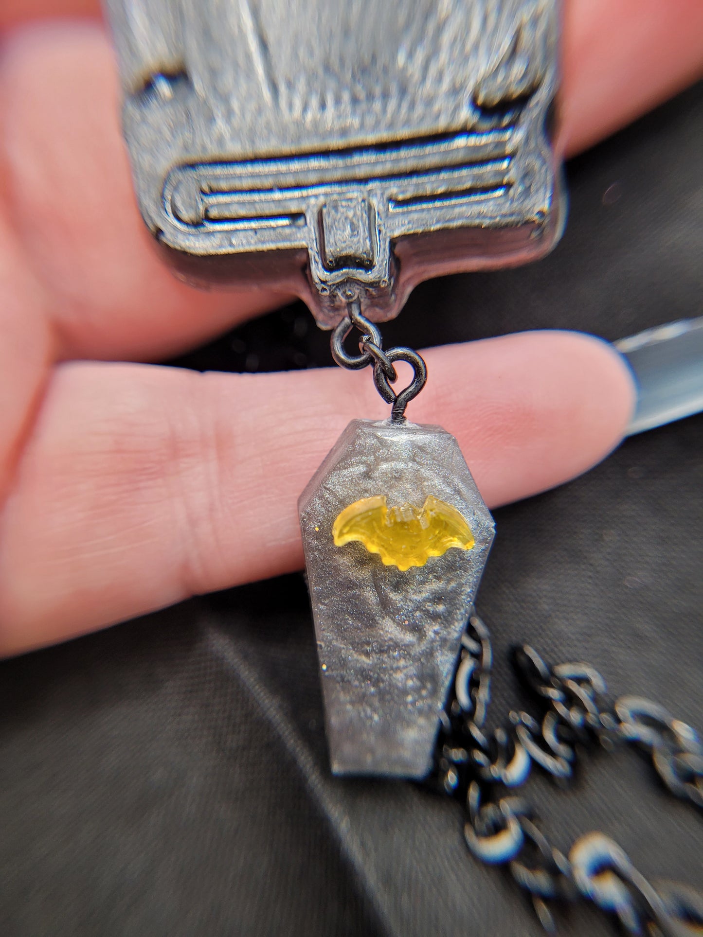 Black, Silver, and Orange Resin Spell Book Tome and Coffin Necklace with Pentacle Pentagram and Bat