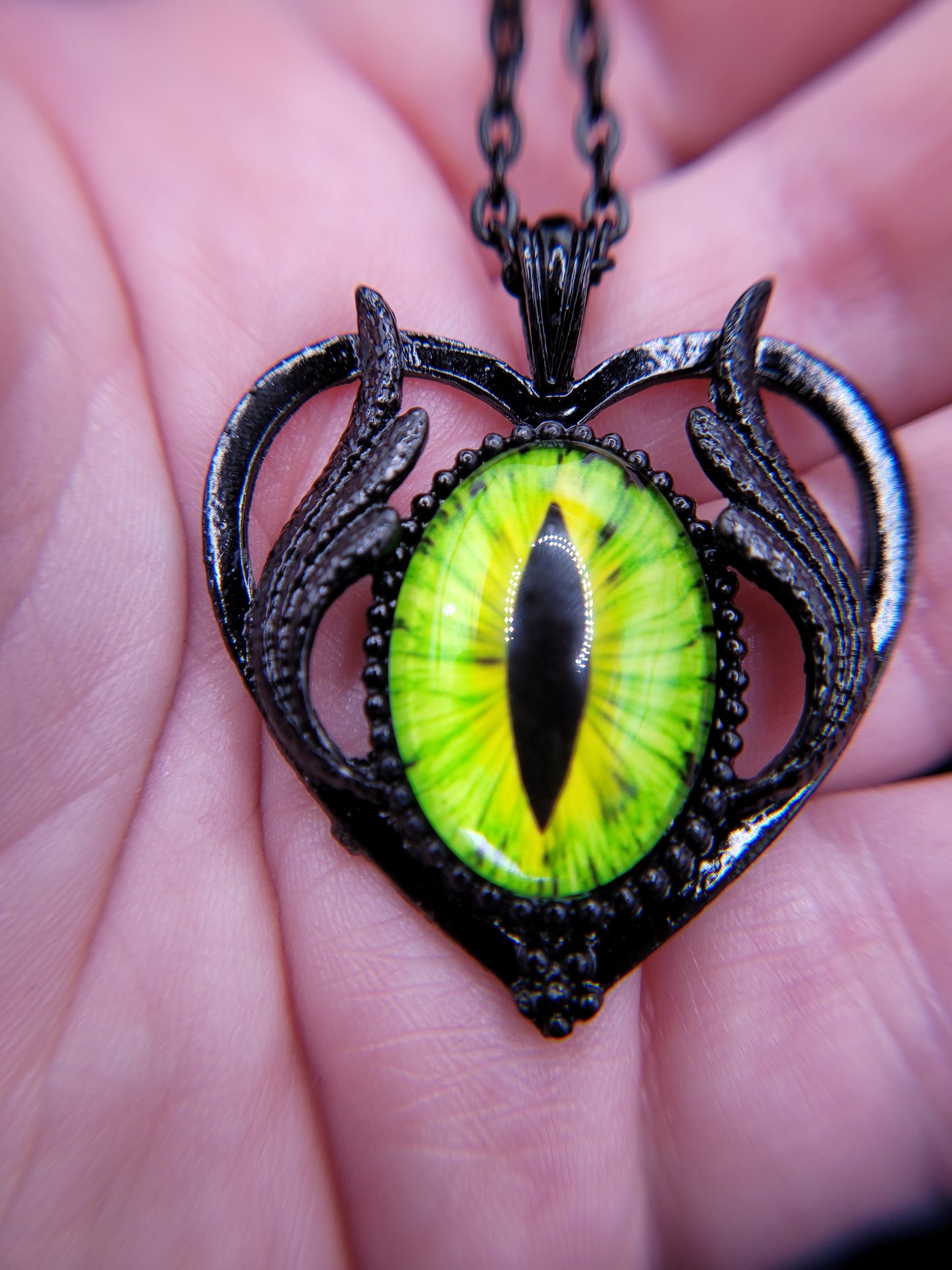 Black and Green or Red Dragon Eye Eyeball RPG DnD TTRPG Gamer Pendant with Black Winged Heart Frame