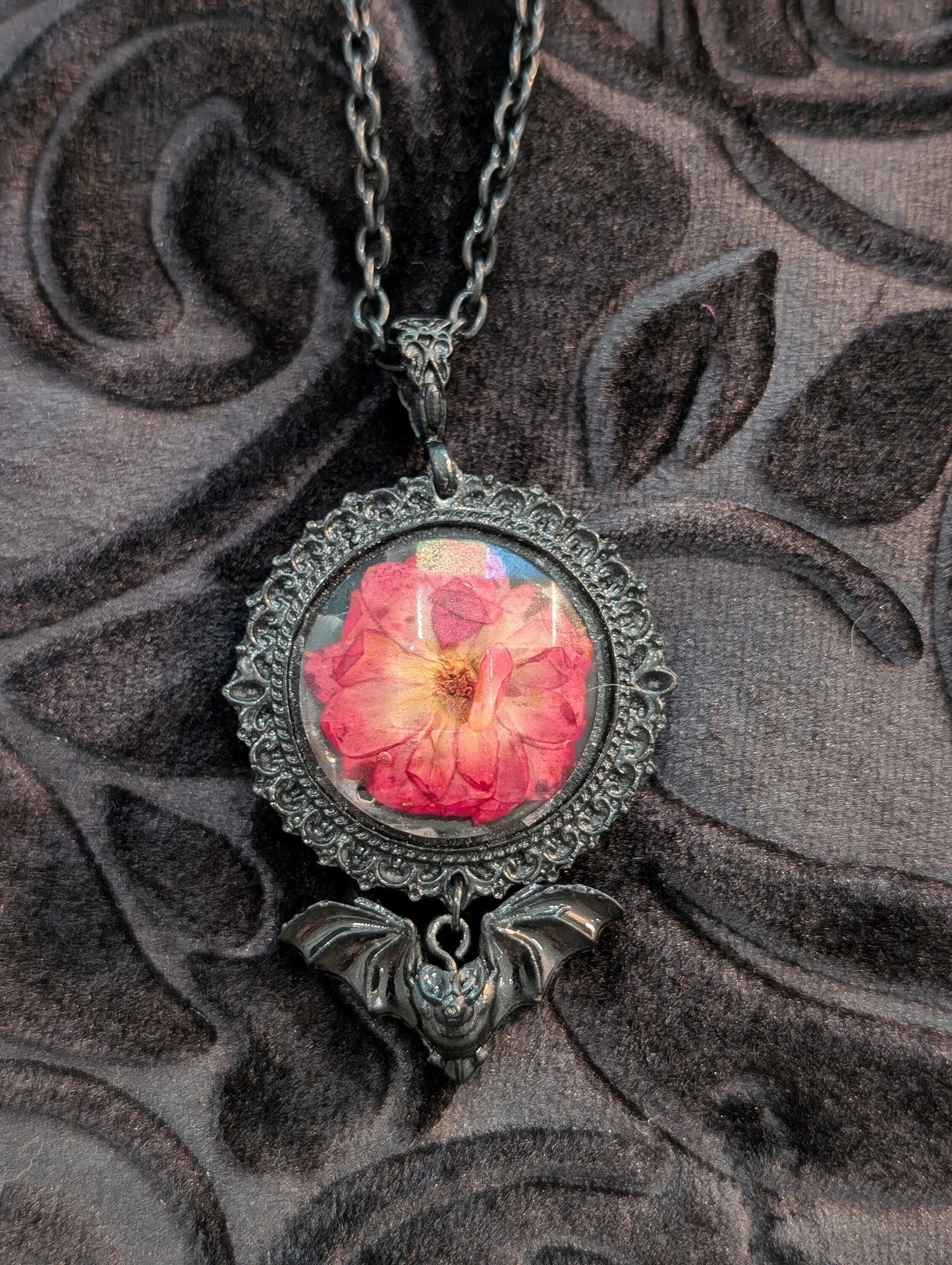 Round Resin Pressed Red Rose and Dangling Black Bat Necklace