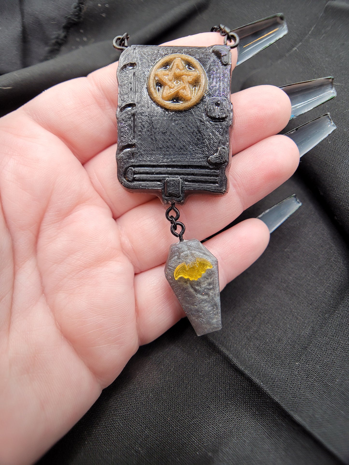 Black, Silver, and Orange Resin Spell Book Tome and Coffin Necklace with Pentacle Pentagram and Bat