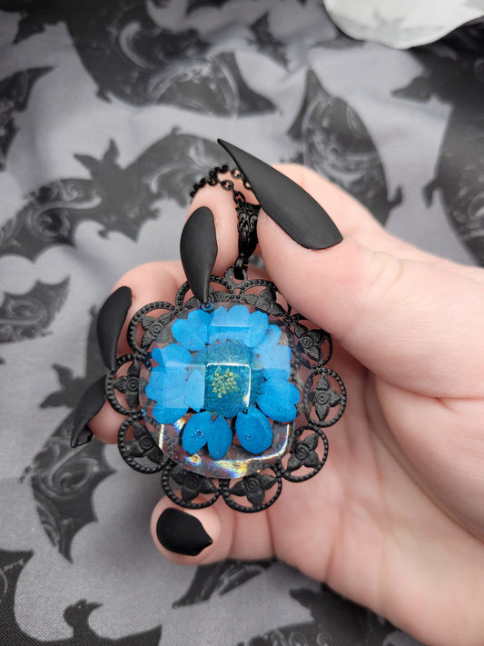 Unique Handmade Black and Blue Resin Faceted Cabochon Pendant Necklace with Dried Pressed Blue Flower and Black Filigree