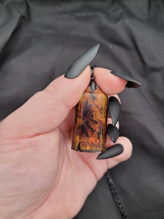 Multichrome Resin Pendant with Black-Green-Red-Orange Shift and Dried Roselle Flower