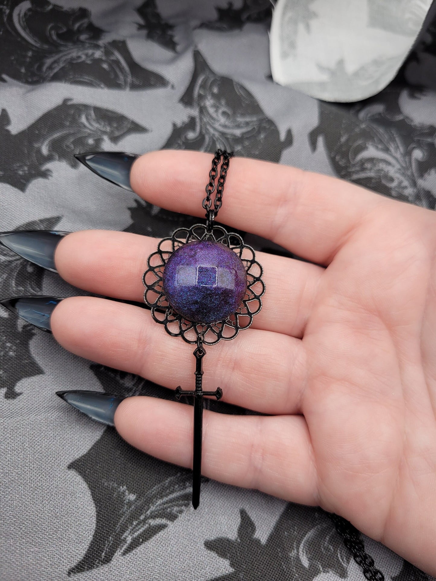 Unique Handmade Goth Multichrome Purple Blue Cabochon Pendant Necklace with Dangle Black Sword Charm