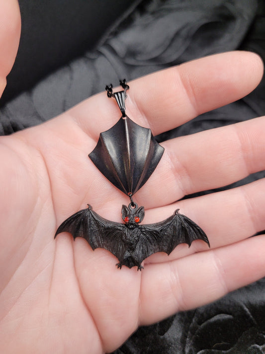 Goth Black Resin Bat Necklace with Red Eyes and Bat Wing Connector