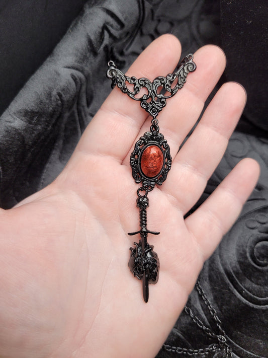 Unique Black and Red Gothic Skull Sword and Anatomical Heart Necklace with Resin Cabochon