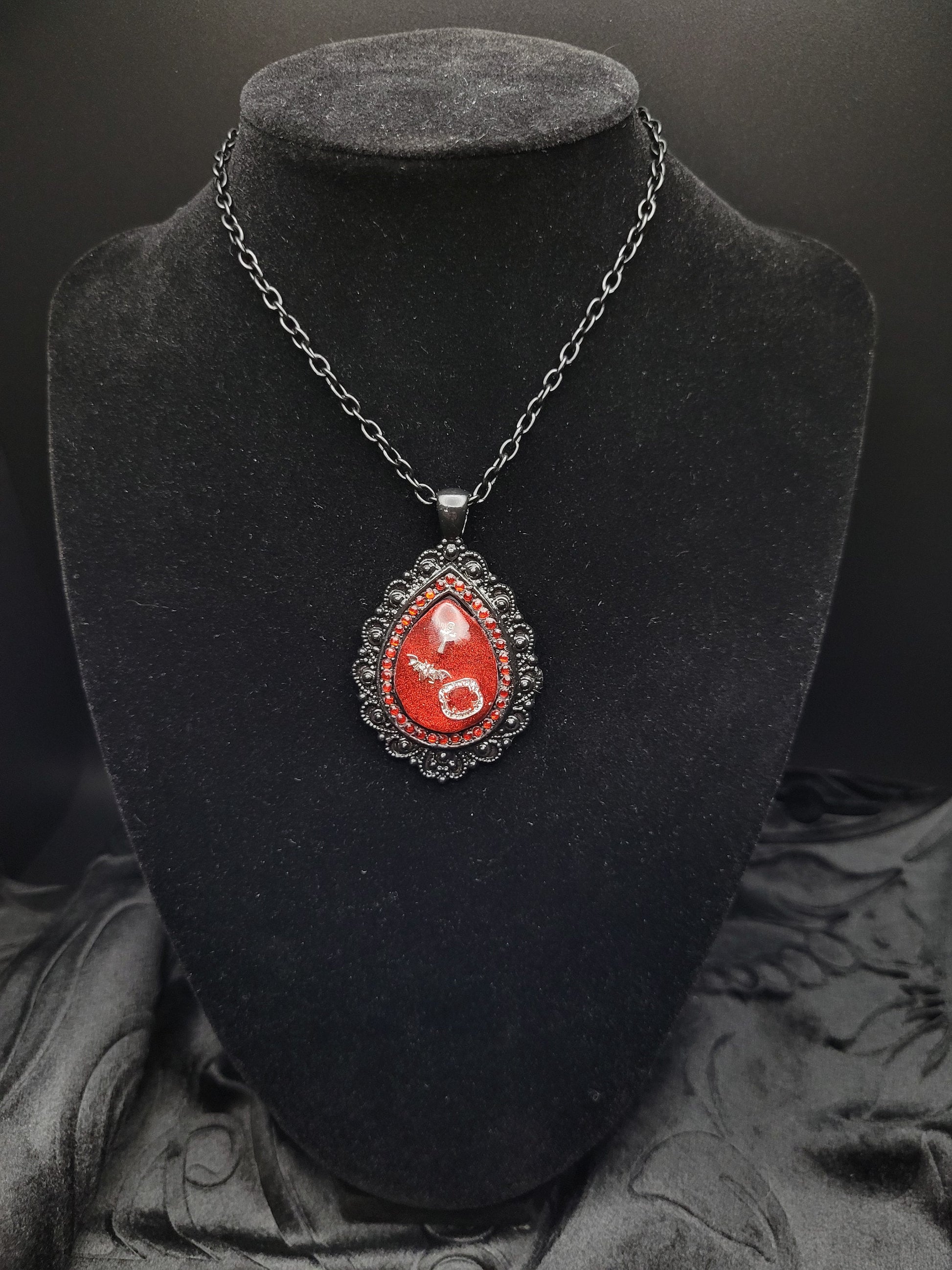 The Masquerade: Black and Red Goth Resin VTM VTMB Teardrop Necklace with Bat, Vampire Fangs, and Ankh